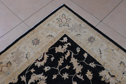 Corner of 6x9 Handmade Black and Beige Ziegler Chobi Wool Rug